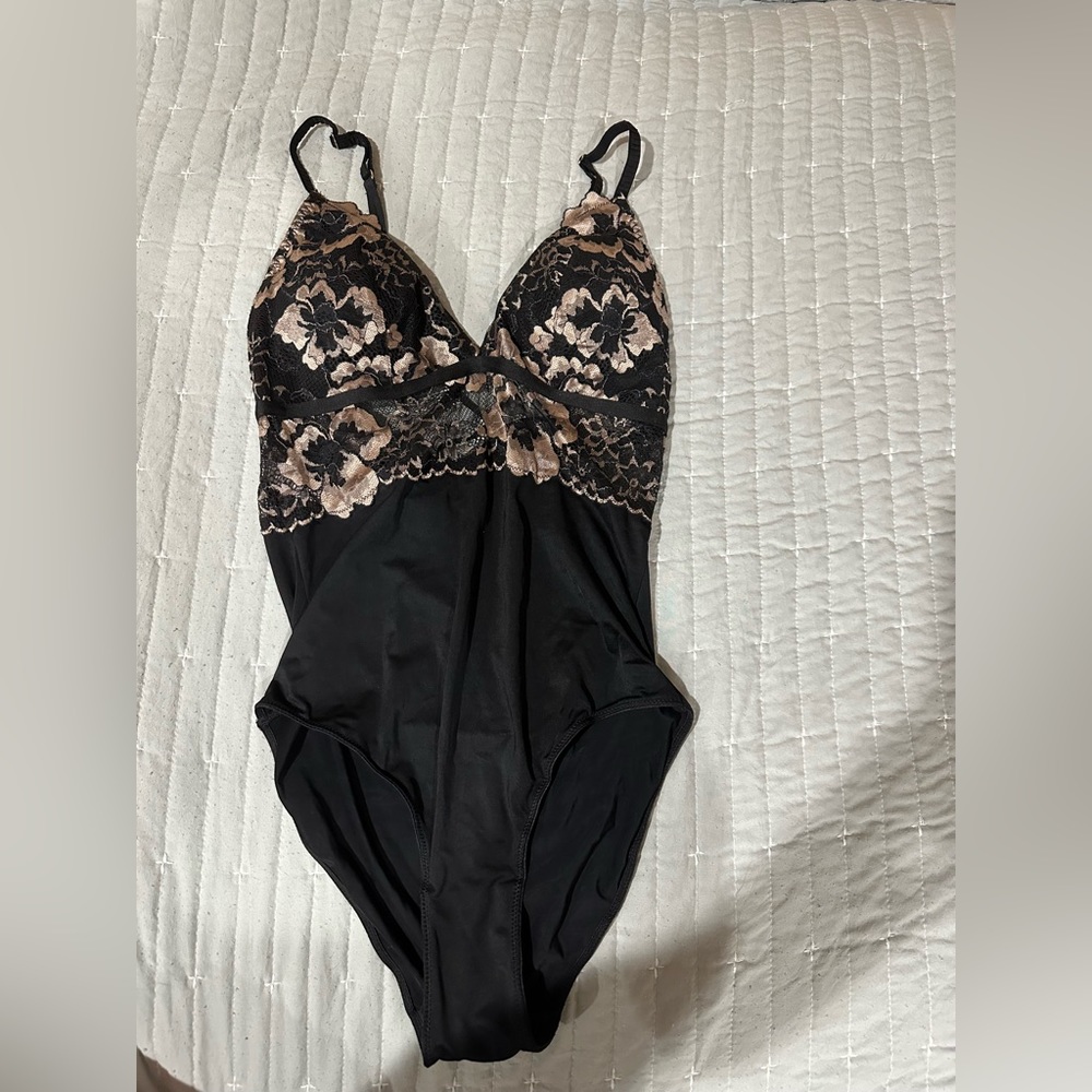 Black and gold lingerie. New with tags. Size medium